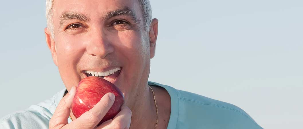 Man eating with dental implants