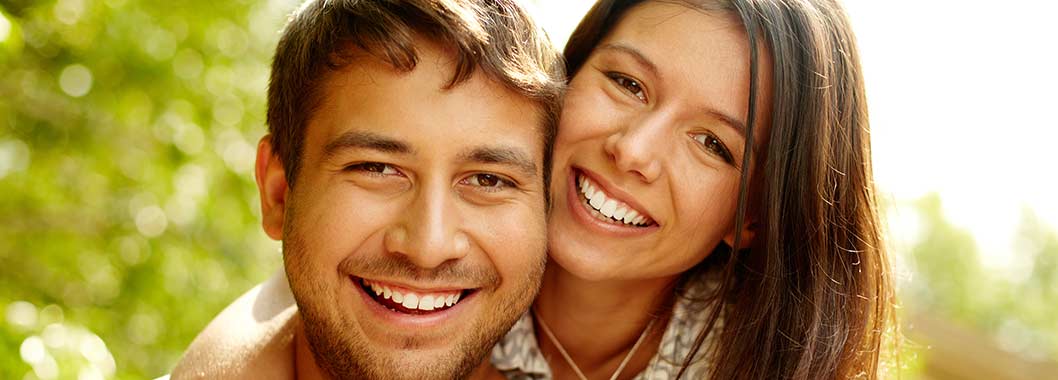 Couple smiling with white fillings